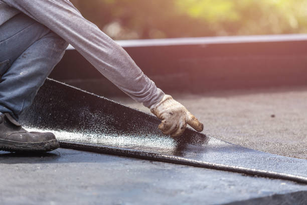 Professional Interior Drainage System technician working in Bayport, NY